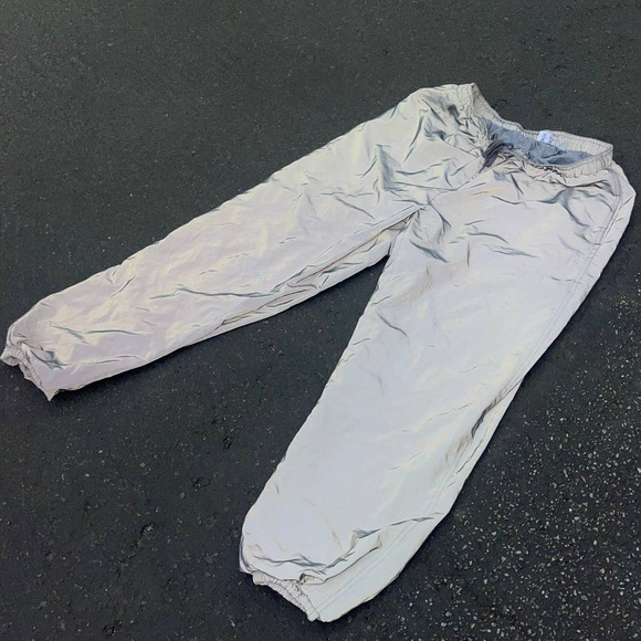 UNDEFEATED 3M Reflective Warm Up Track Pants - Picture 1 of 6